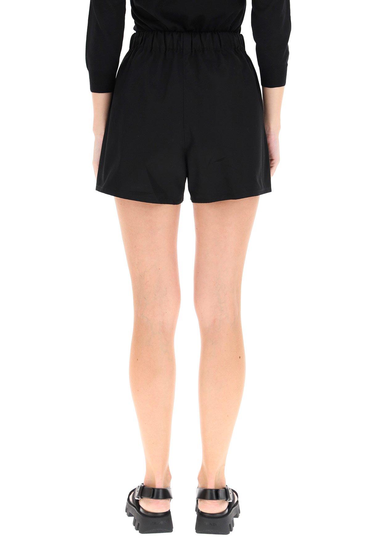 Prada Cotton Logo Patch Shorts in Black - Lyst