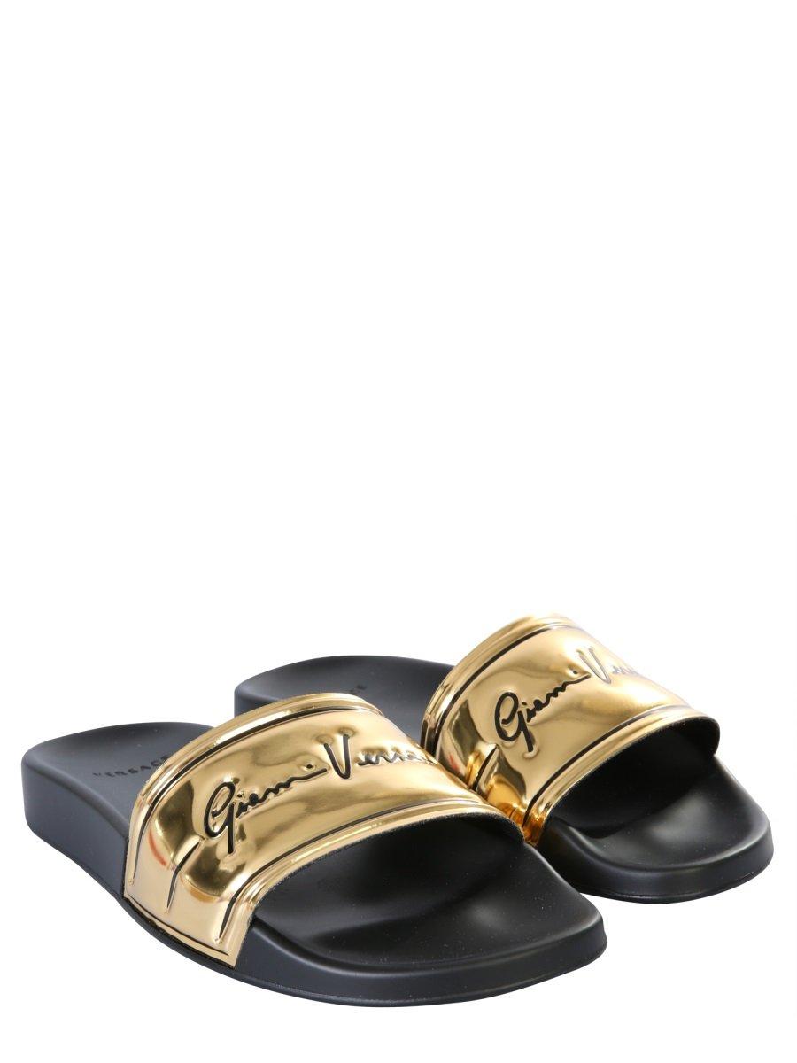 Versace Rubber Logo Slides in Gold (Metallic) - Lyst