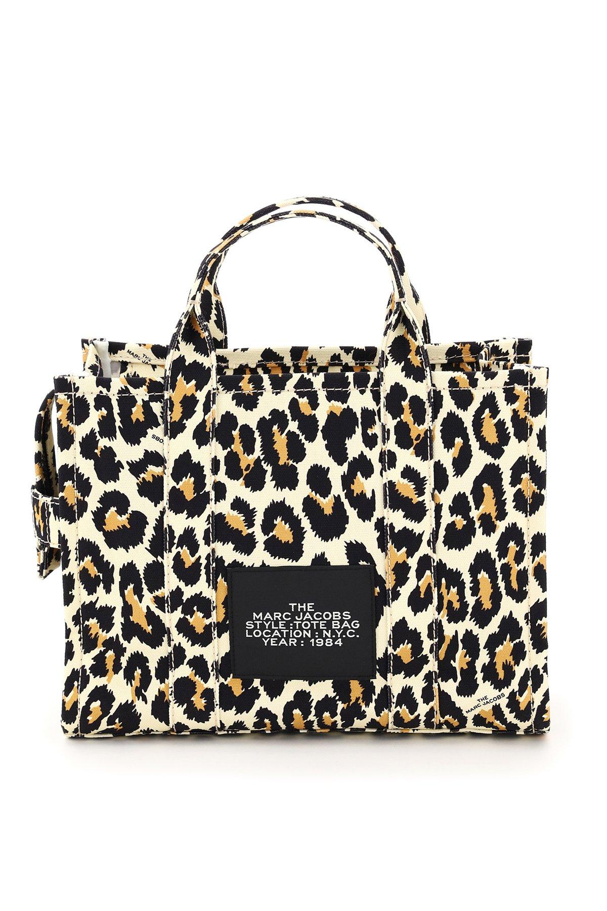 Marc Jacobs - Amber with THE LEOPARD TRAVELER TOTES. Shop