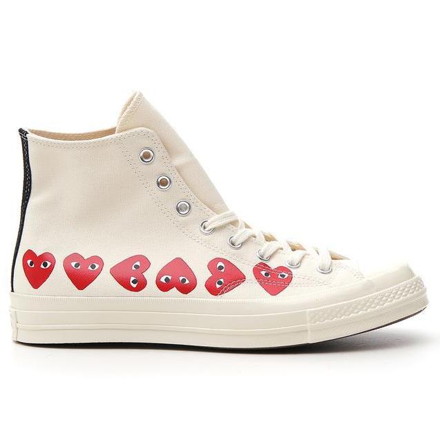 chuck taylors with heart