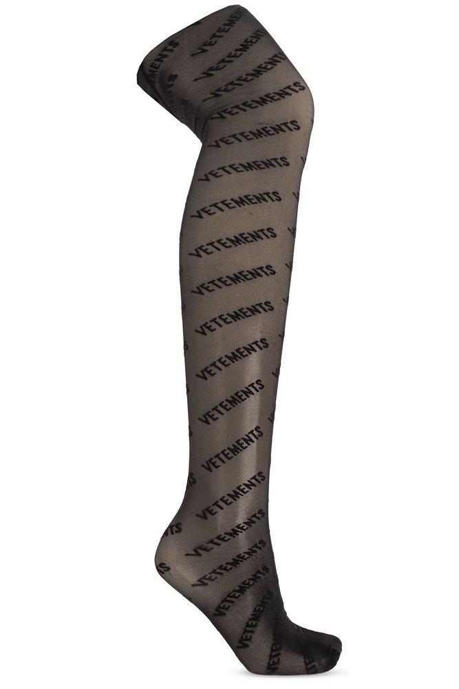 Vetements X Wolford All-over Logo Printed Silk Stockings in Black
