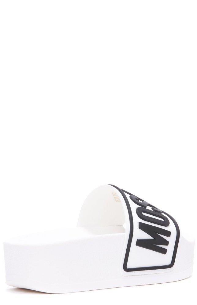 Moschino Logo Embossed Slip-on Slides in White | Lyst