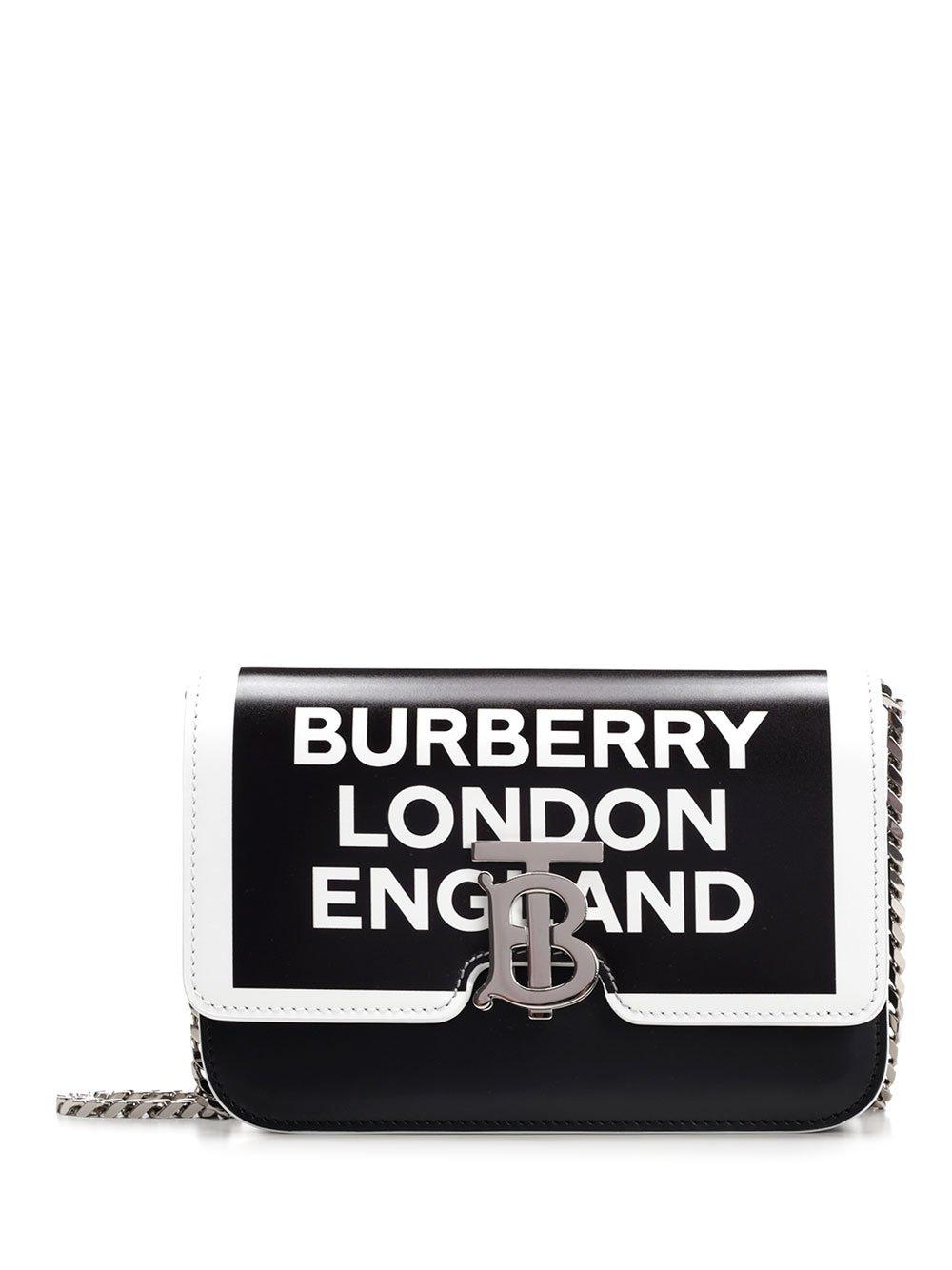 Lyst - Burberry Monogram Clasp Leather Cross-body Bag in Black - Save 43%