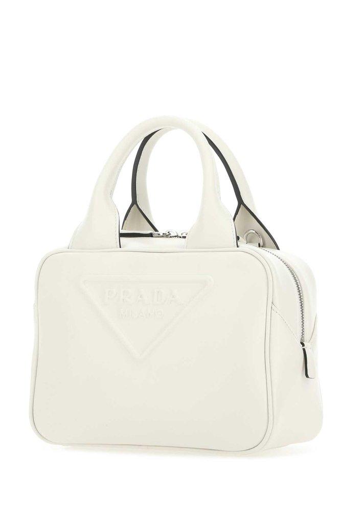 Prada Logo-embossed Top Handle Bag in White | Lyst