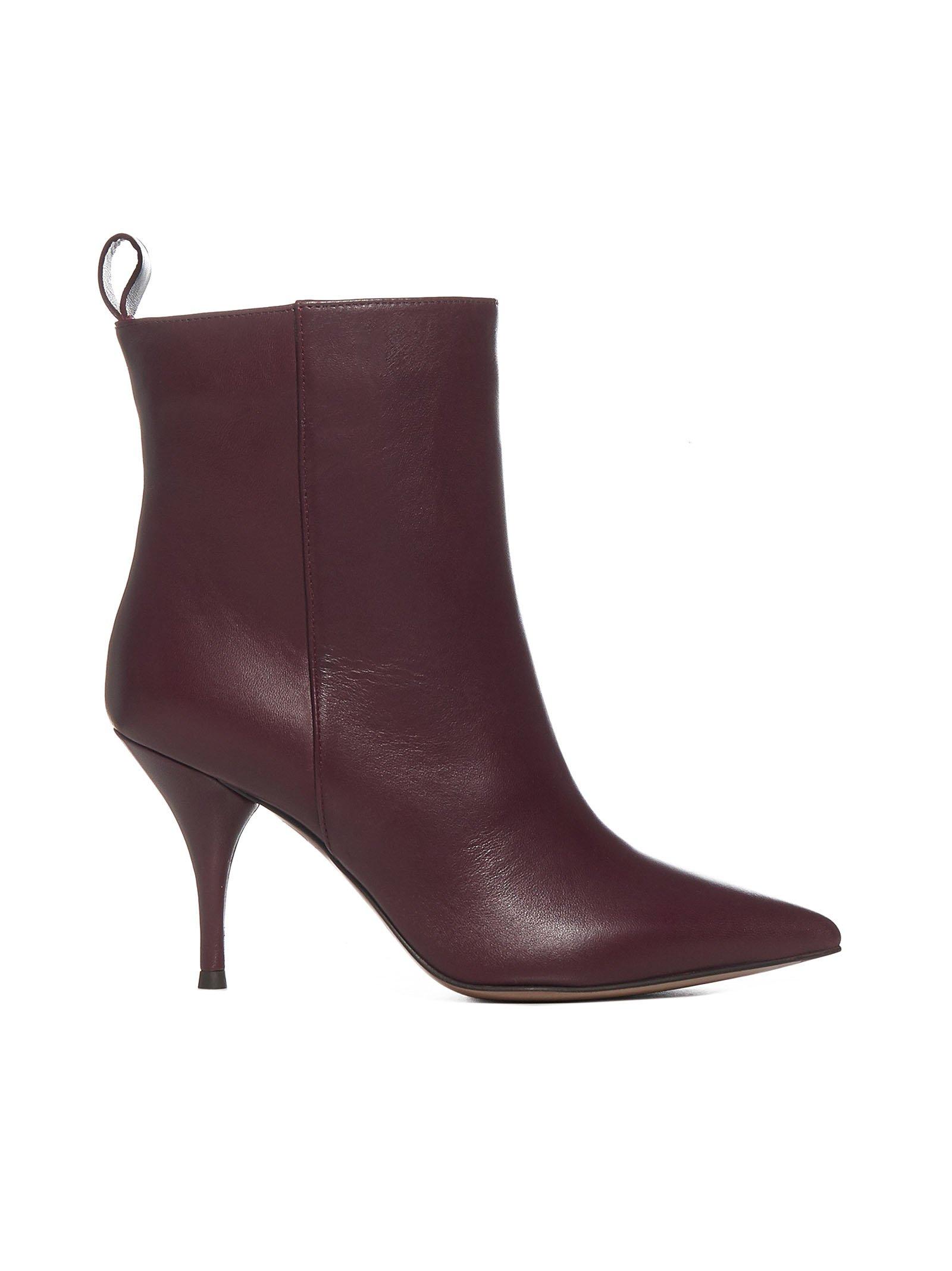 red pointed ankle boots