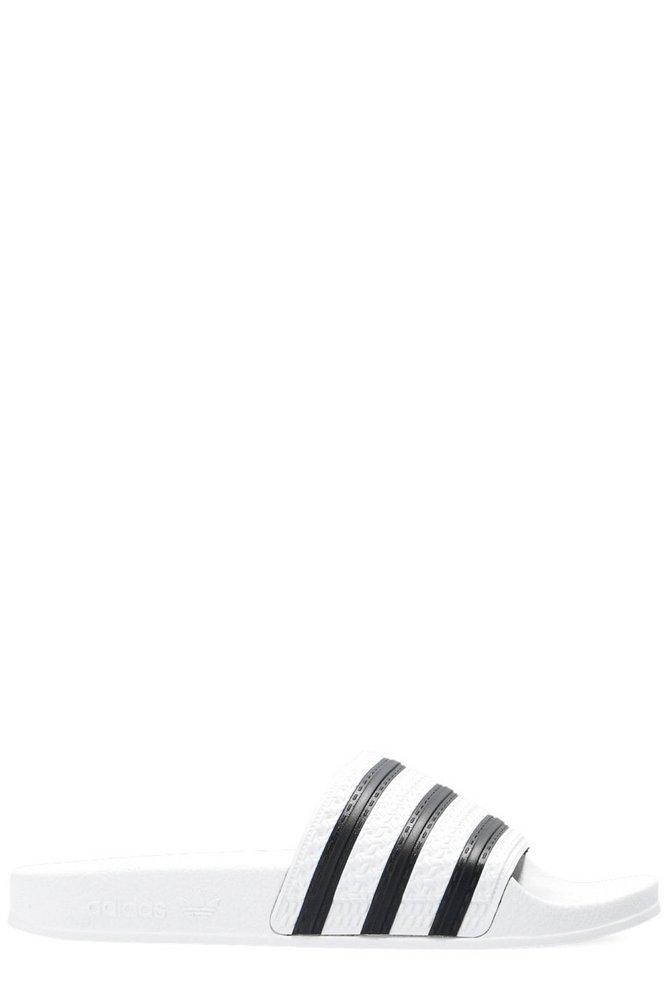 adidas Originals Adilette Slip on Slippers in White for Men Lyst UK