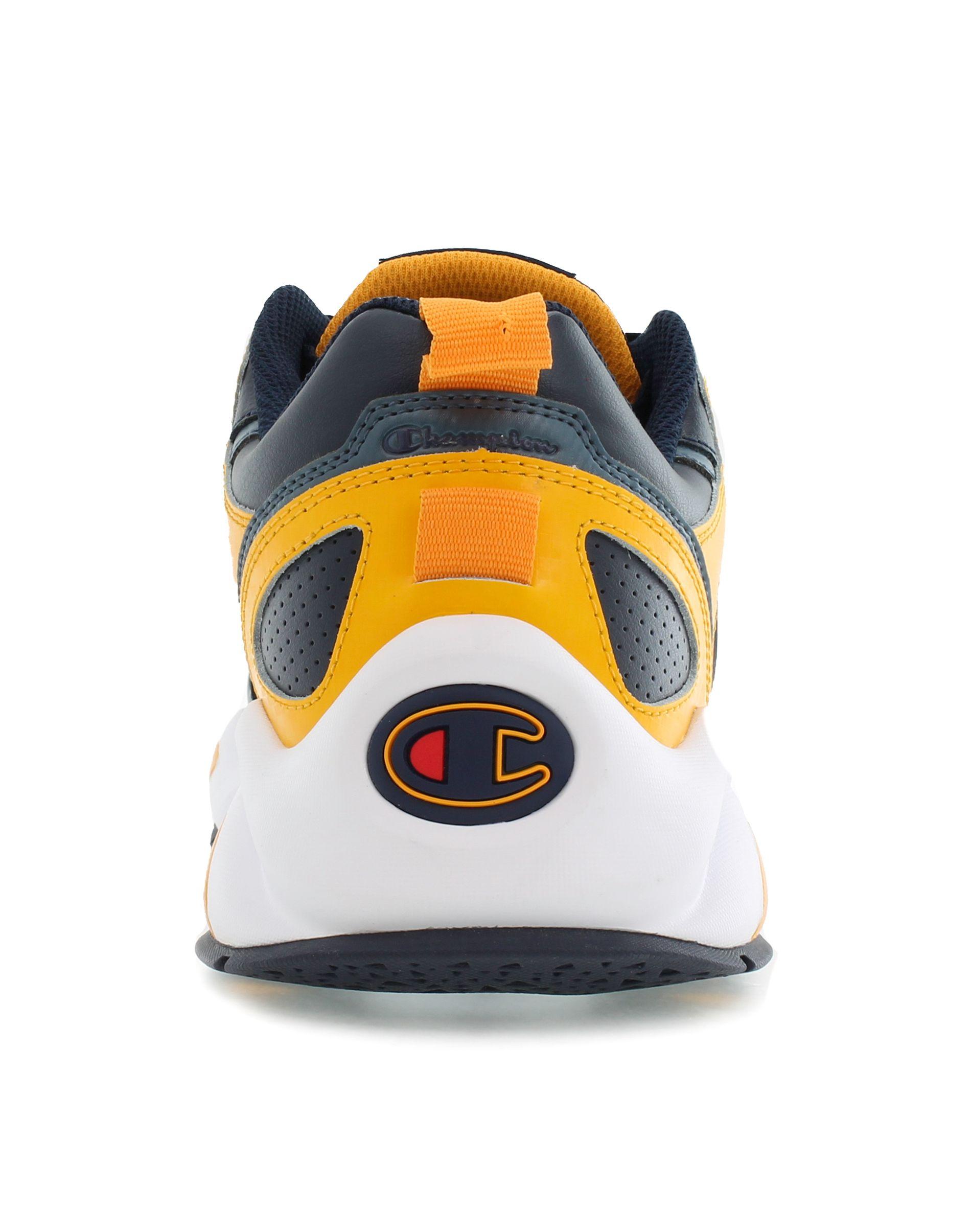 blue and yellow champion shoes