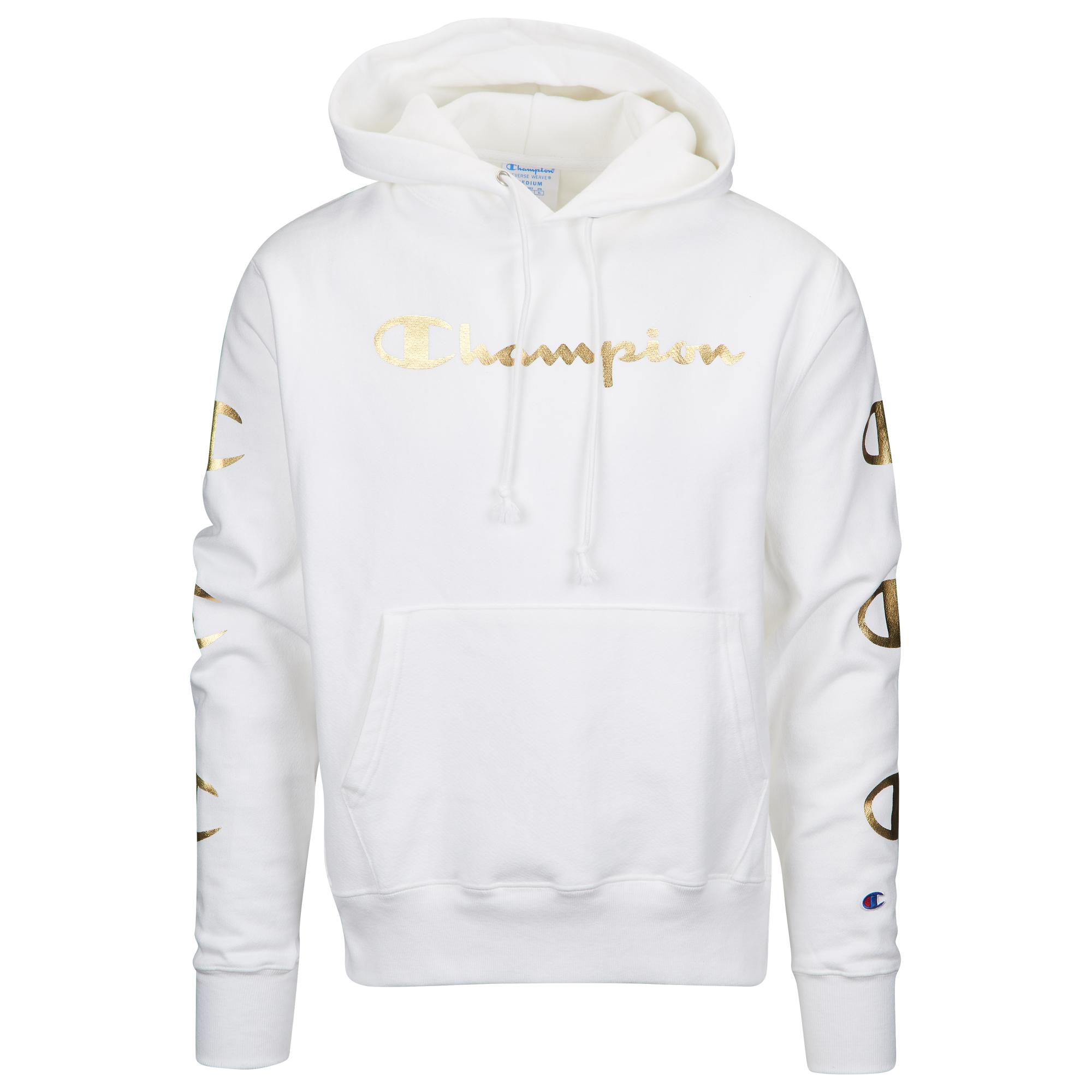 gold and white champion hoodie