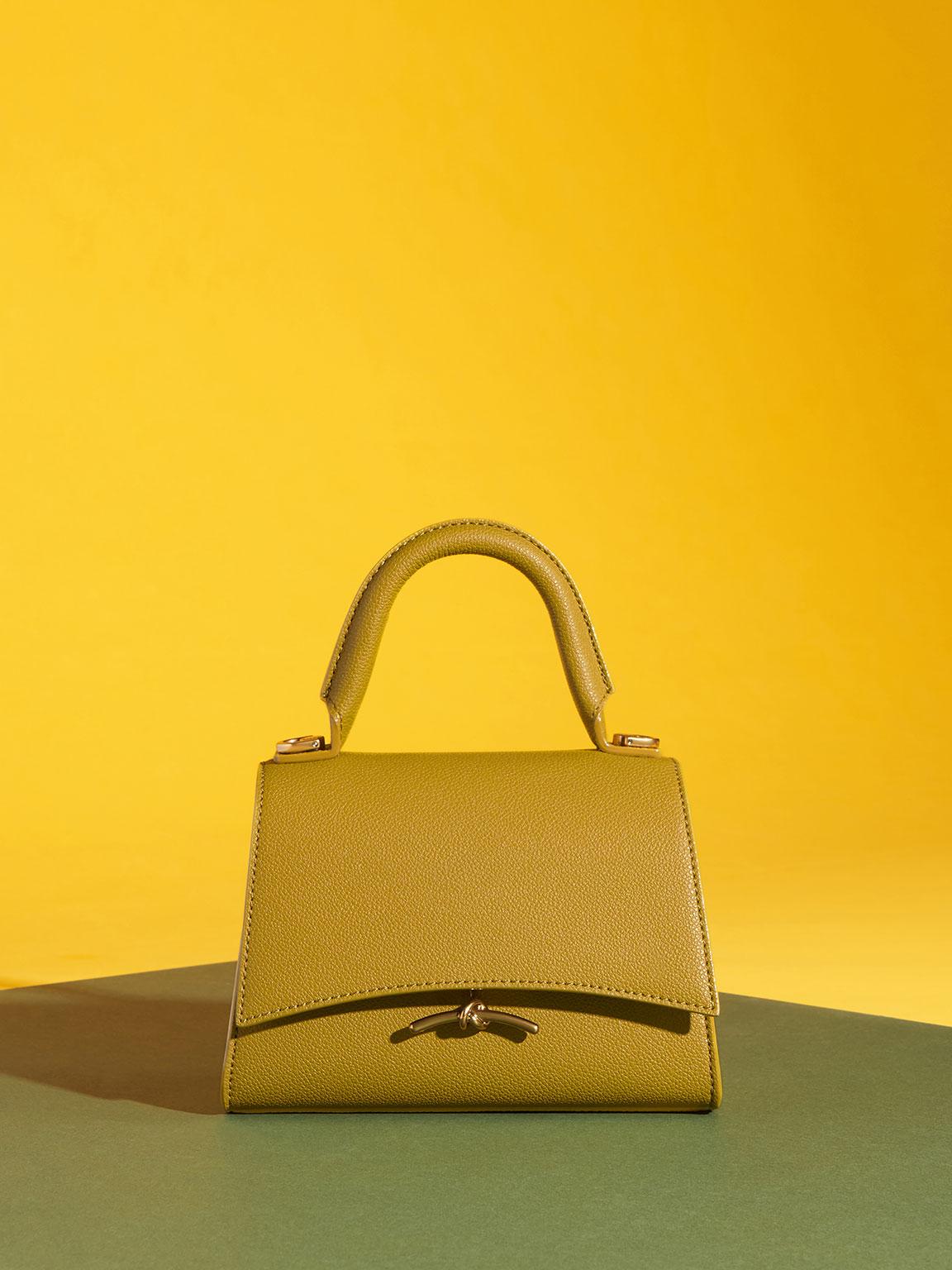 metallic push lock crossbody bolsa charles and keith