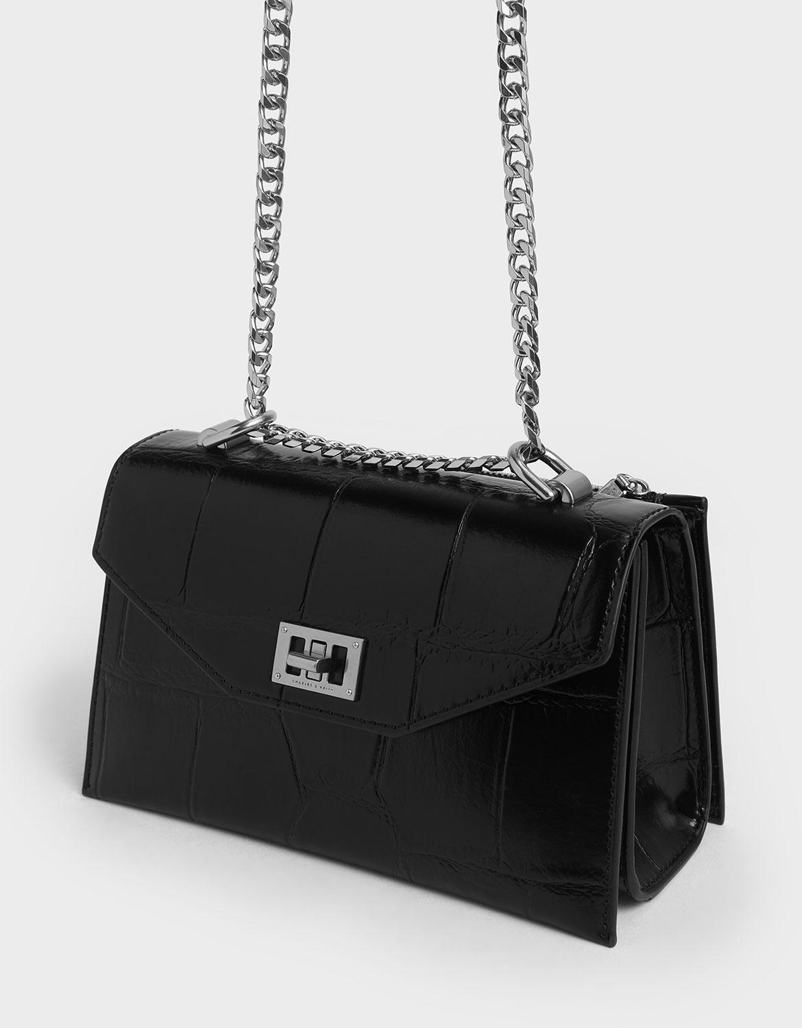 charles and keith turn lock crossbody bolsa