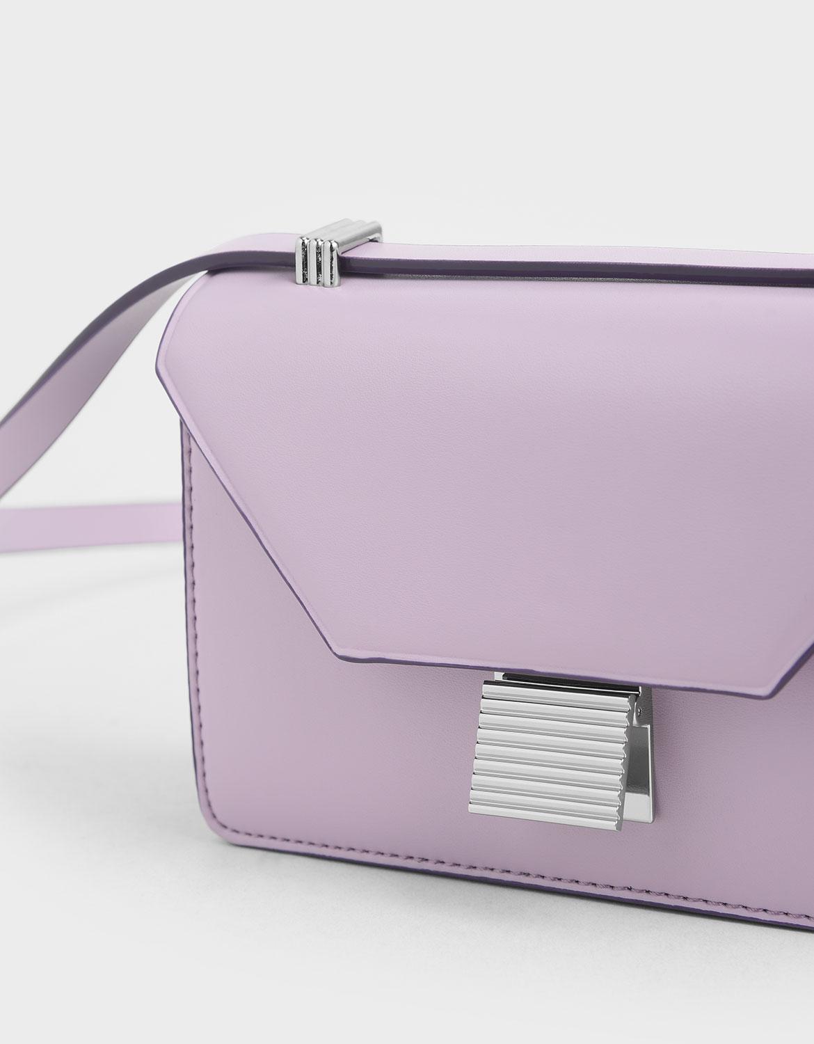 metallic push lock crossbody bolsa charles and keith