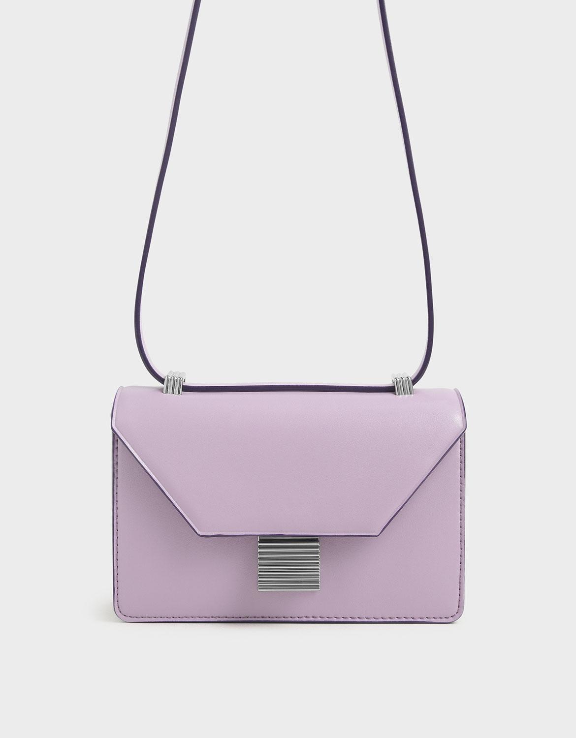 metallic push lock crossbody bolsa charles and keith