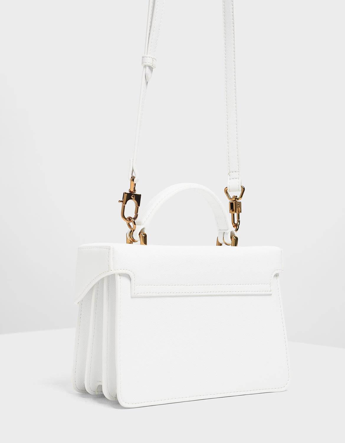 classic push lock top handle bag