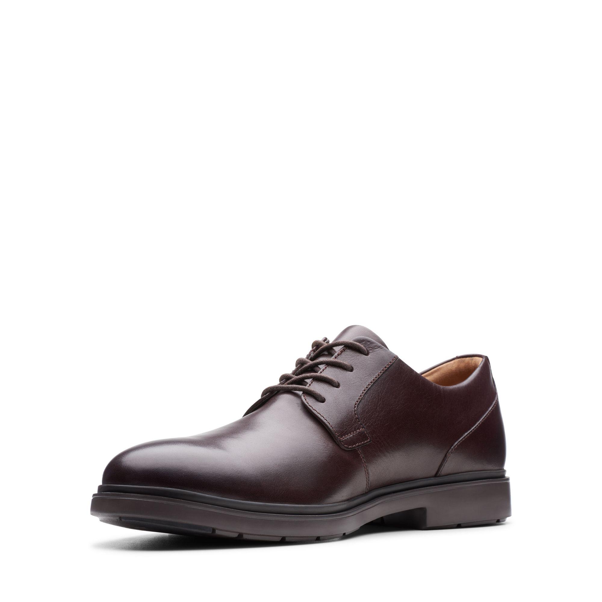 un tailor cap tan leather