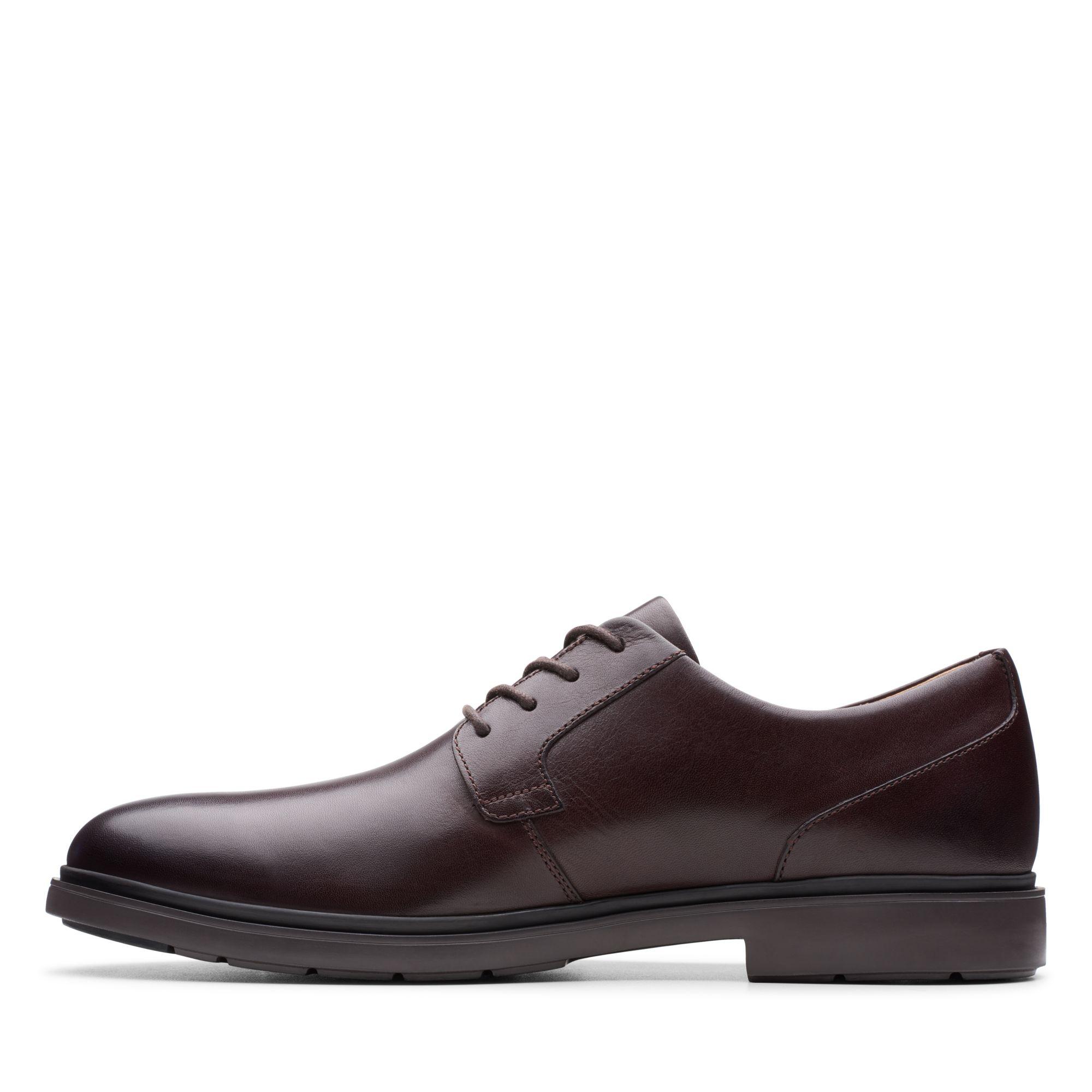 un tailor cap tan leather