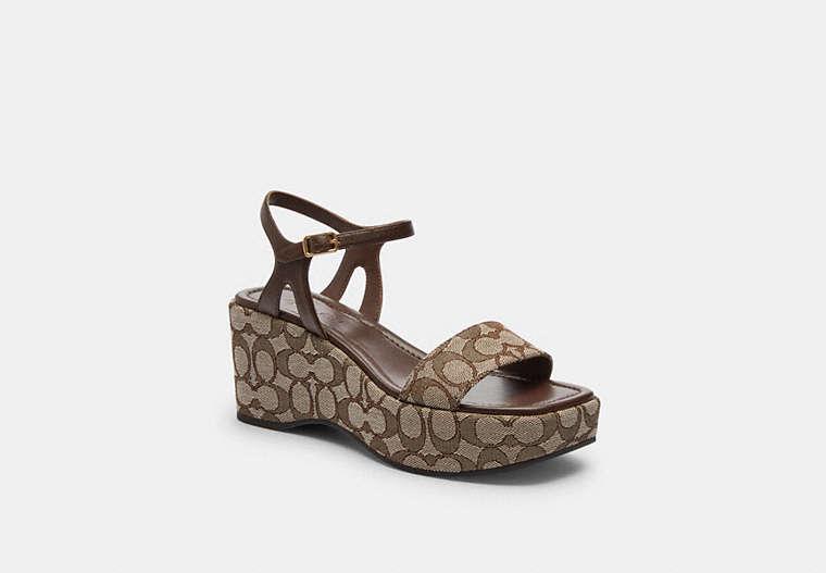 ウェッジヒールでスタイルアップ【COACH】Galeウェッジサンダル COACH Gale Wedge Sandal in Black | Lyst