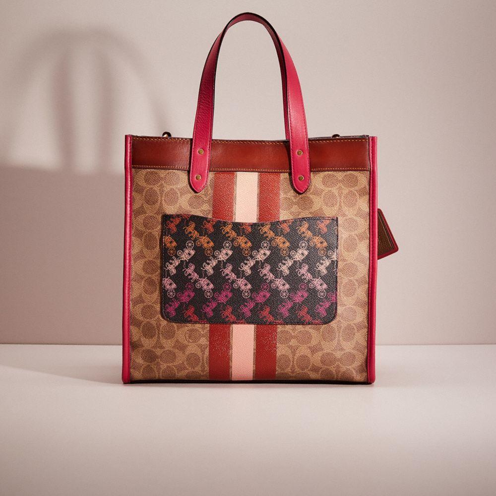 Field tote with store horse and carriage print