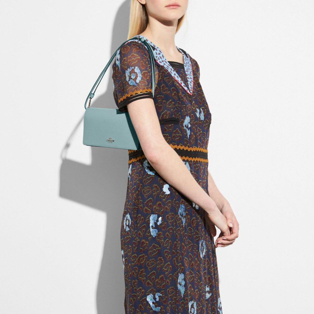 coach hayden foldover