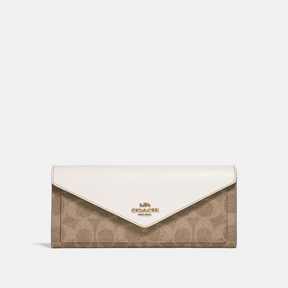 coach soft wallet in colorblock signature canvas