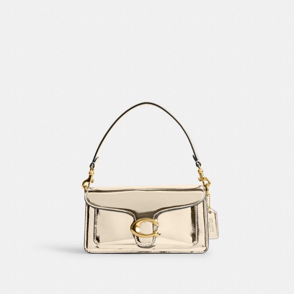 gold coach tabby bag