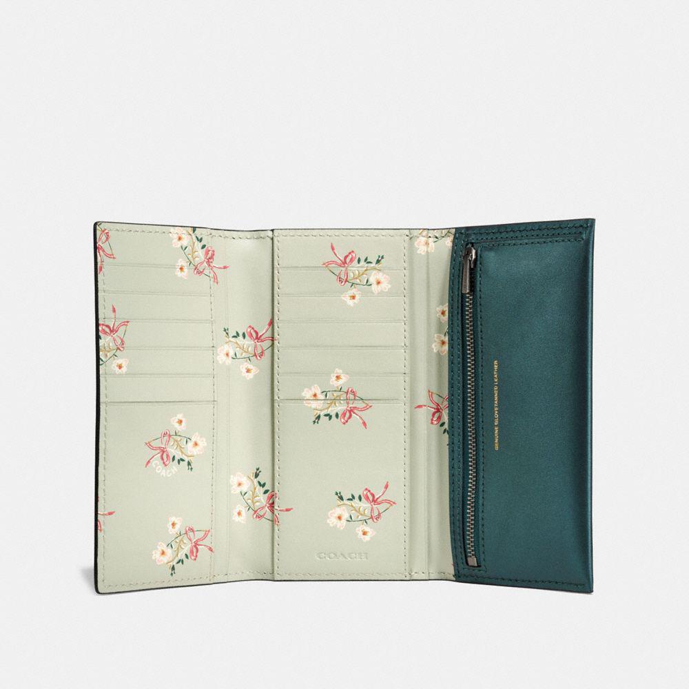 COACH Leather Slim Trifold Wallet With Floral Bow Print Interior 