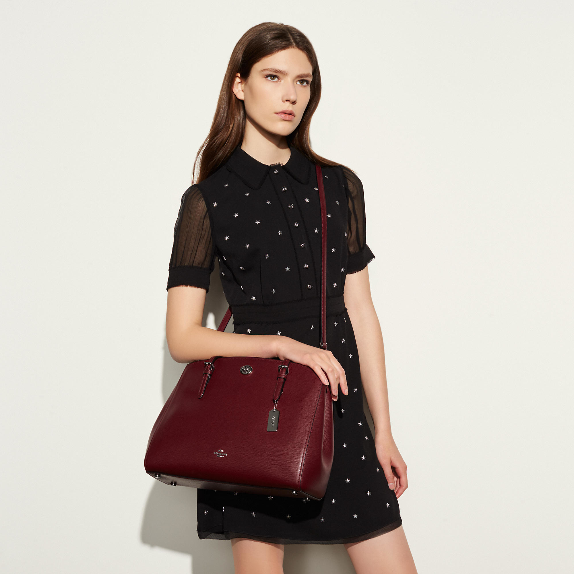 coach charlie turnlock carryall