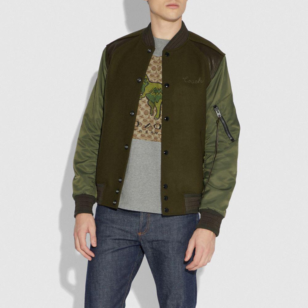 olive green varsity jacket