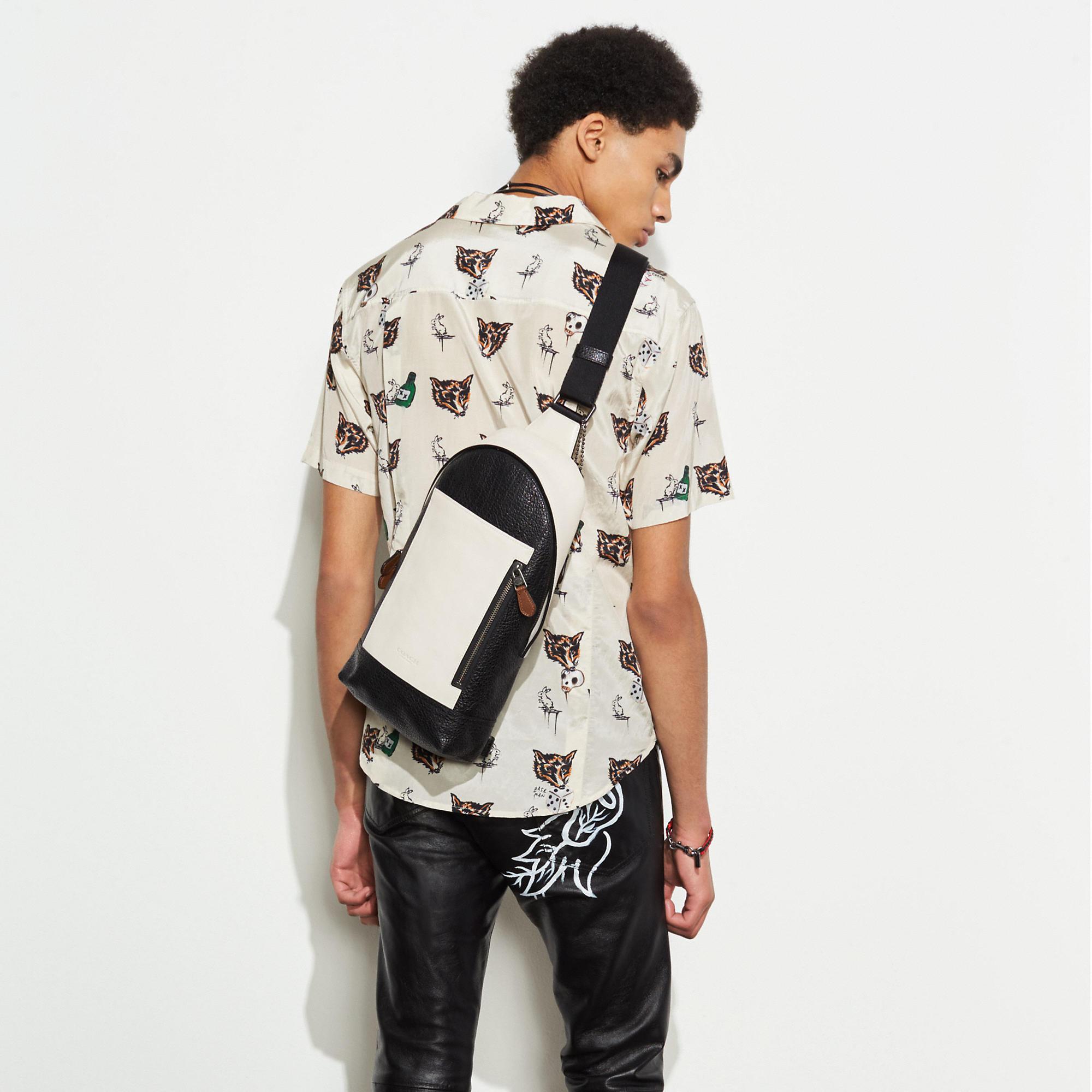 coach manhattan sling pack price