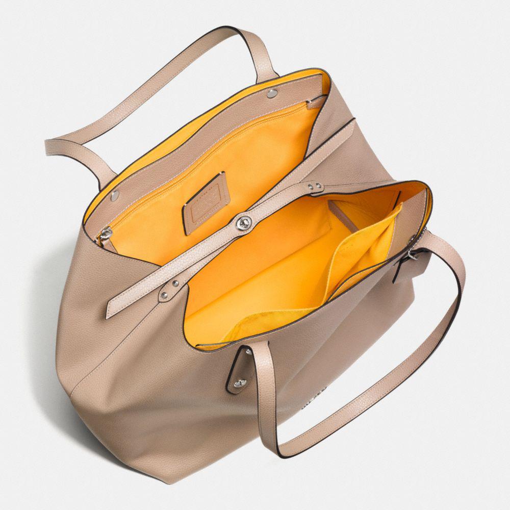 tan sling bag