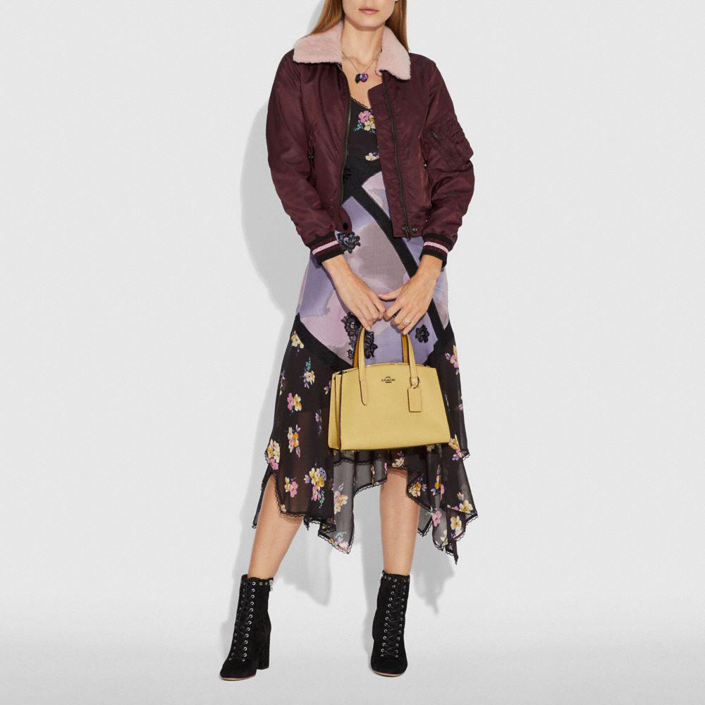 coach charlie carryall 28 oxblood