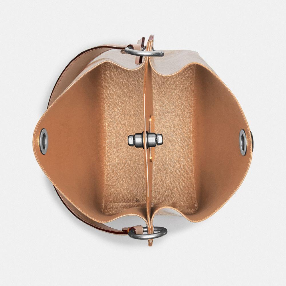 coach charlie bucket bolsa in signature canvas