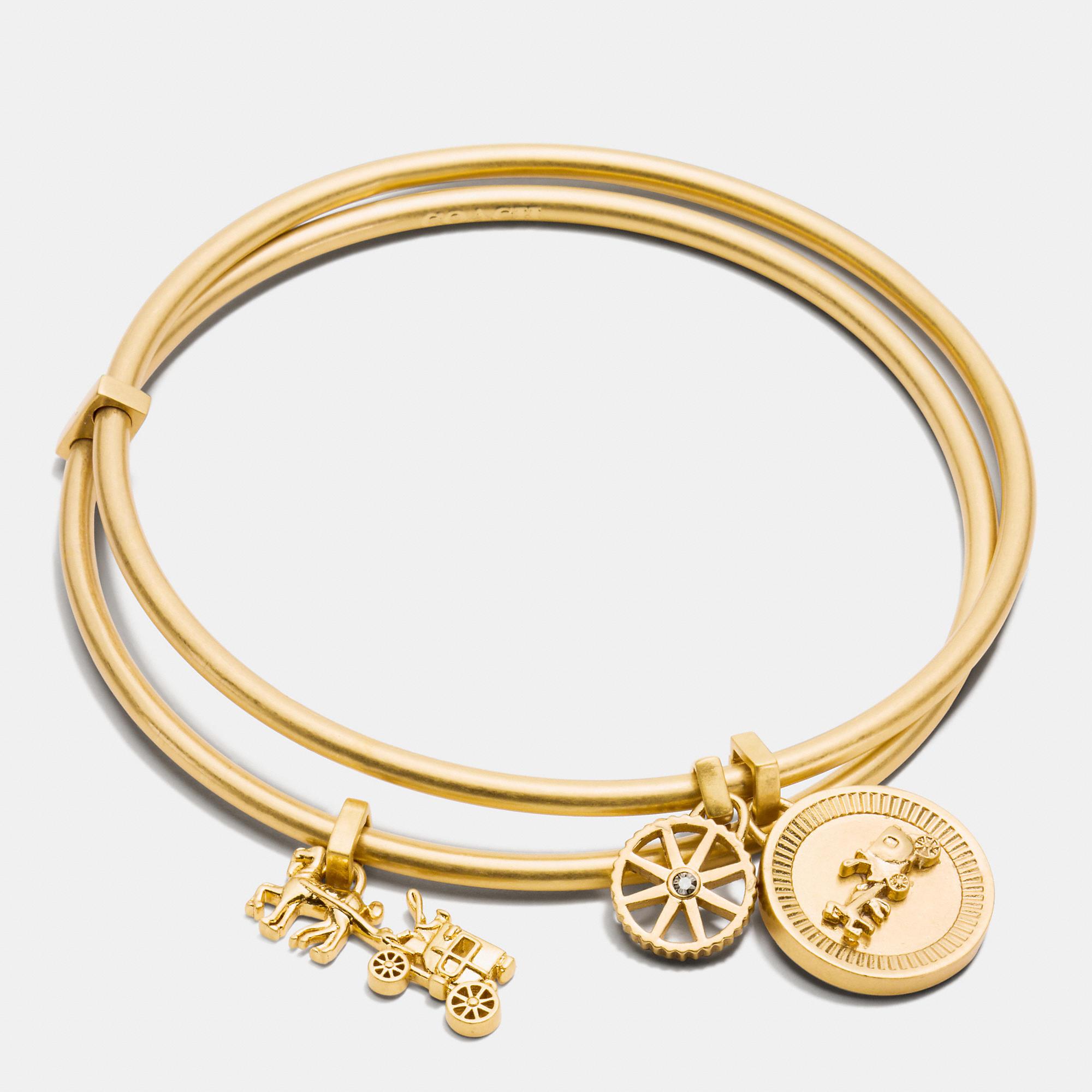 COACH Horse And Carriage Coin Bangle Set in Gold (Metallic) - Lyst