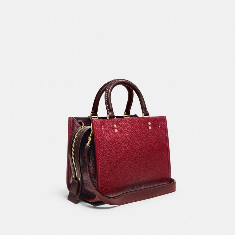 Coach rogue oxblood rivets top