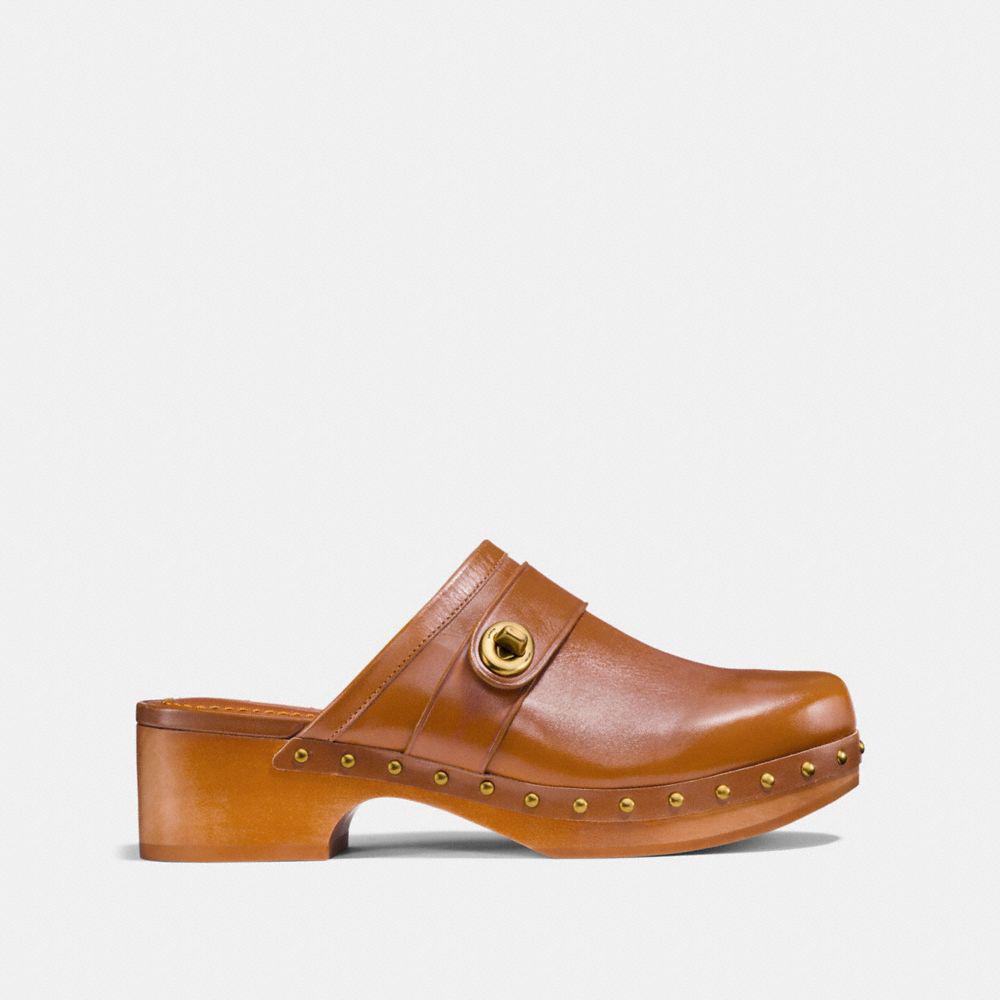 coach turnlock clogs