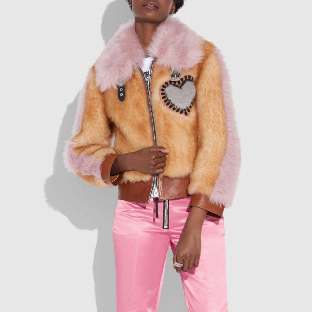 COACH X Keith Haring Shearling Jacket in Pink | Lyst