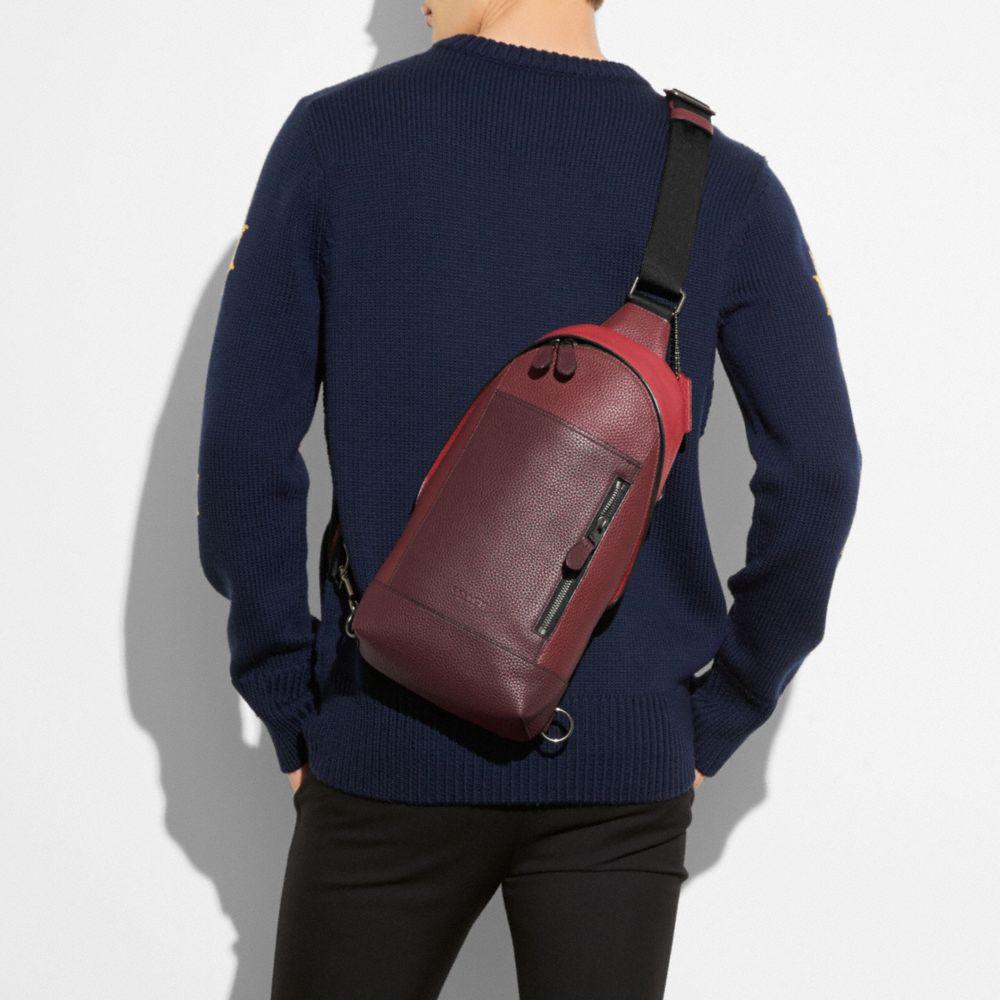 coach manhattan sling pack price