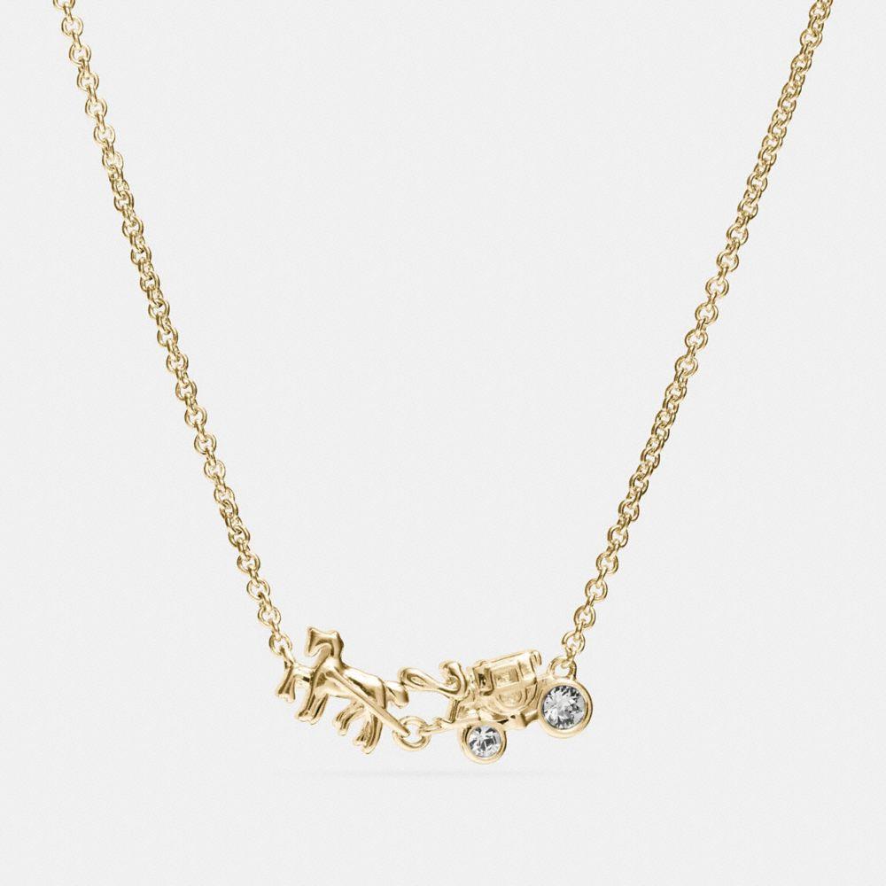 COACH Sterling Silver Horse And Carriage Necklace in Metallic | Lyst