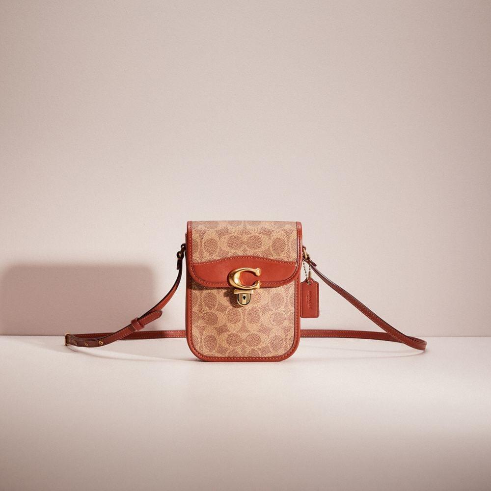 COACH: Noa shoulder bag in leather and coated canvas with logo