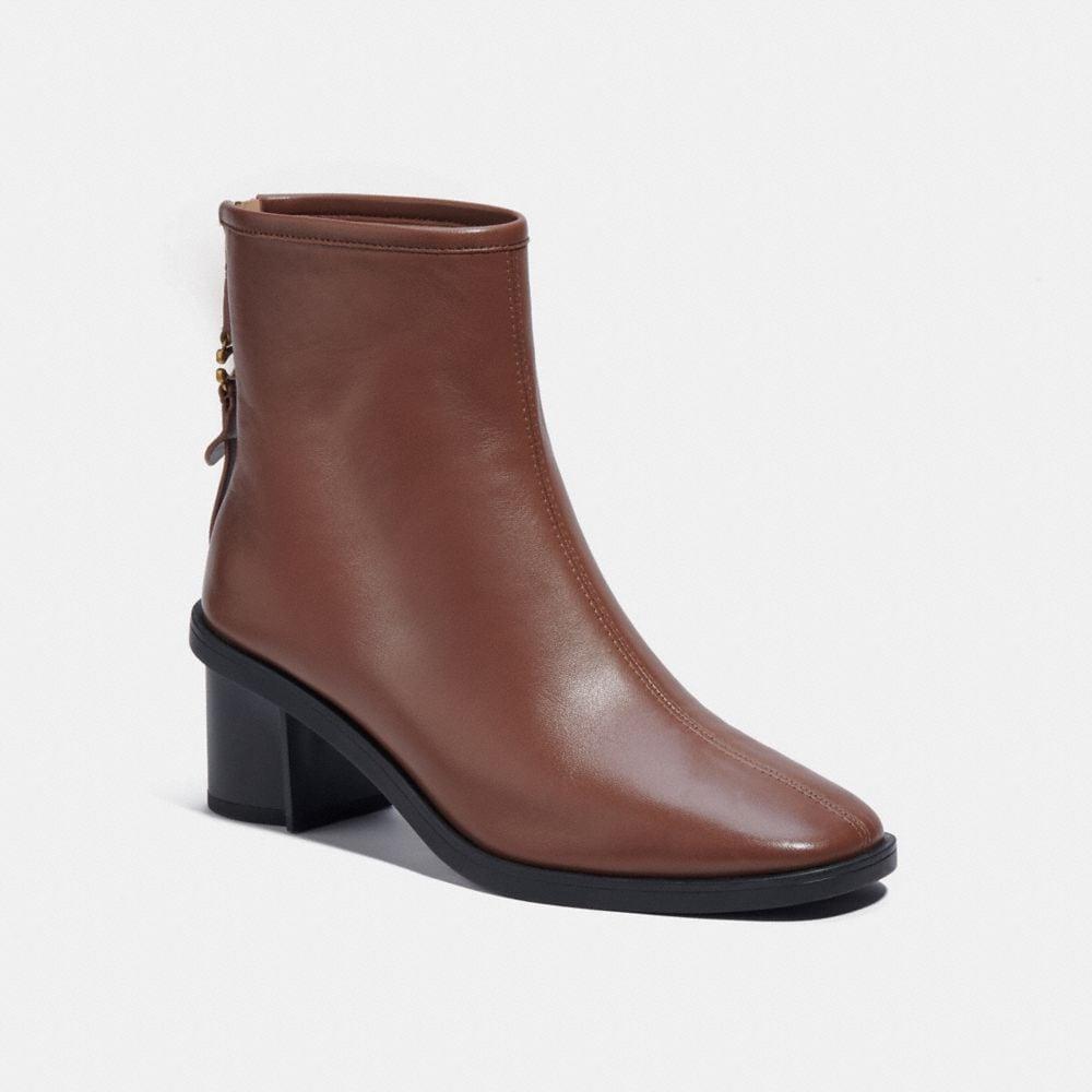 debi bootie coach