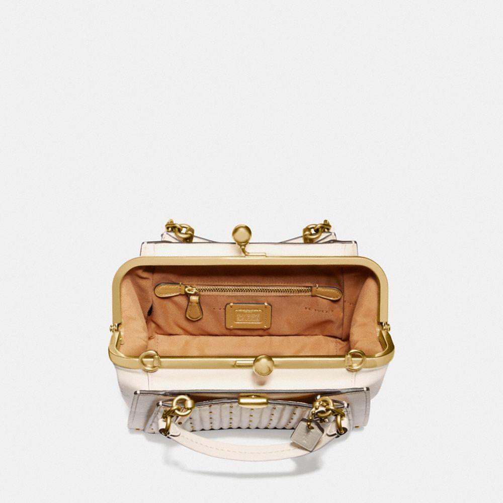 coach kisslock dreamer 21 with quilting and rivets