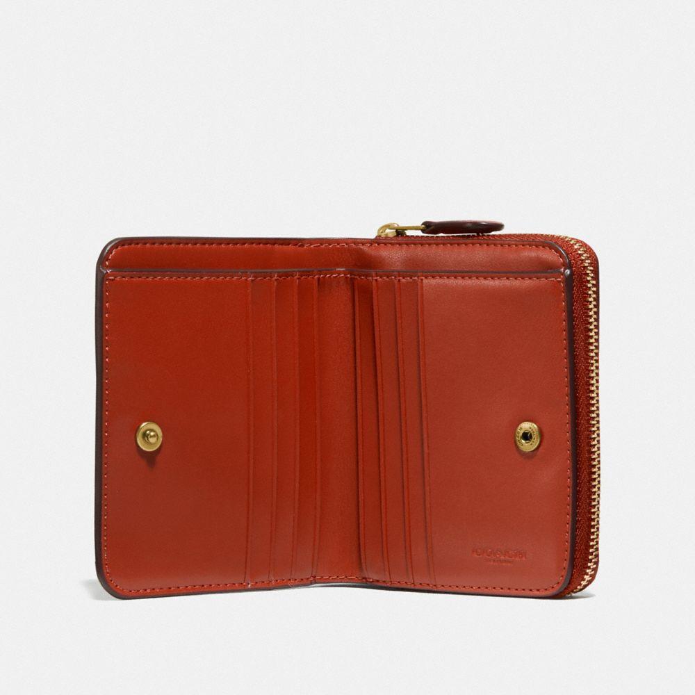 coach bifold wallet in signature canvas