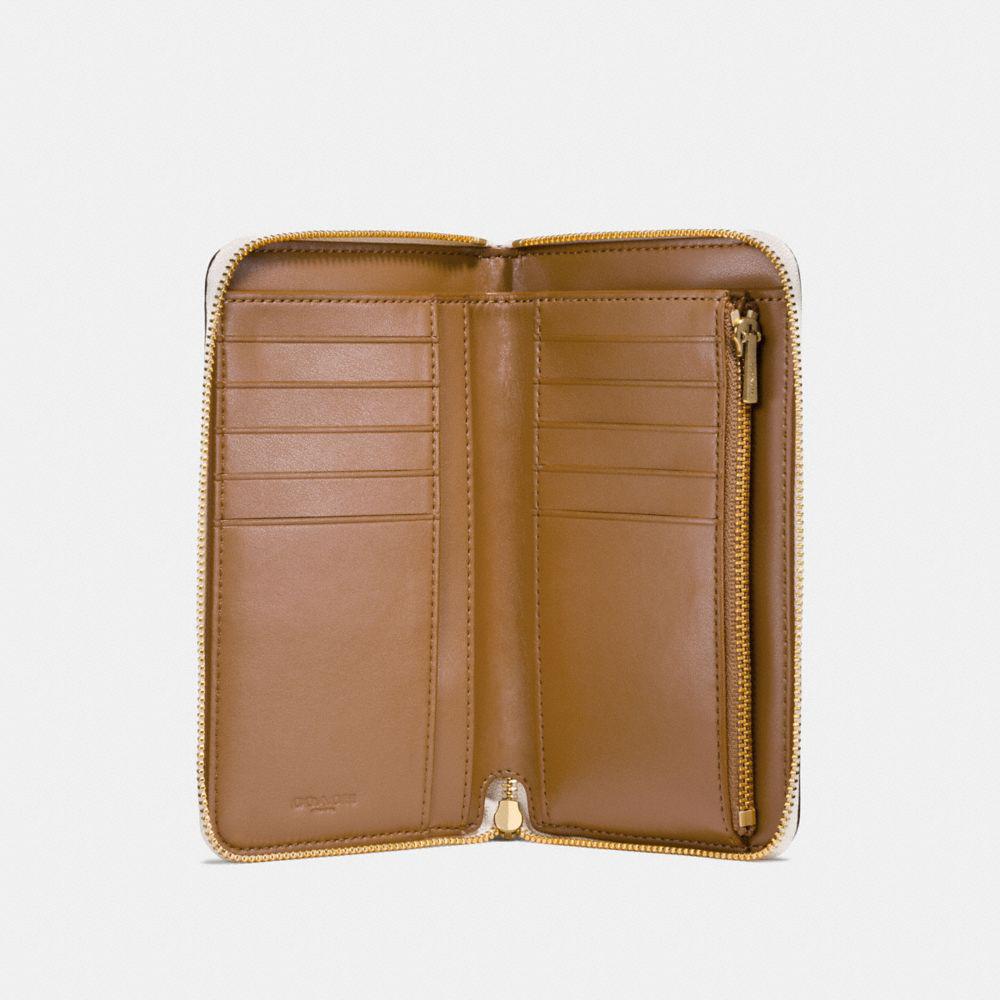 COACH Leather Medium Zip Around Wallet With Floral Bow Print Lyst