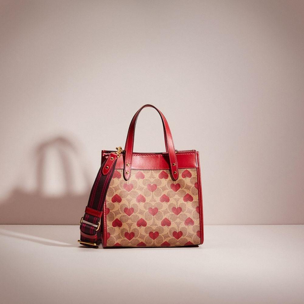 coach heart print bag