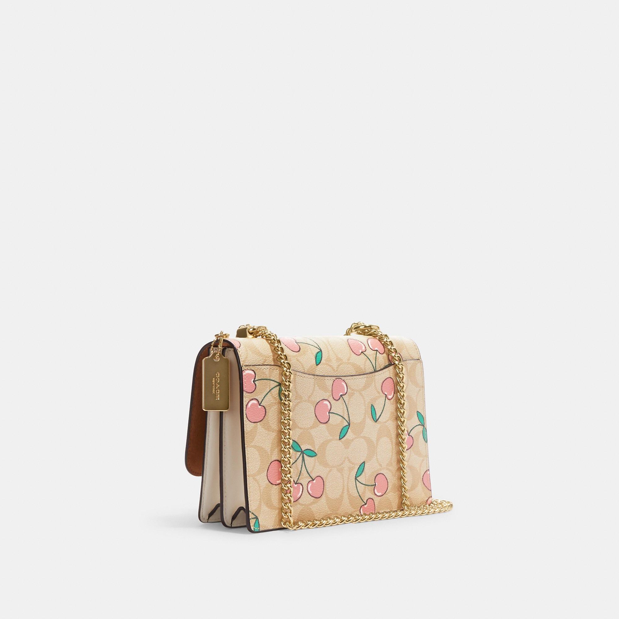 Coach Outlet Klare Crossbody In Signature Canvas With Heart Cherry Print in  Natural | Lyst