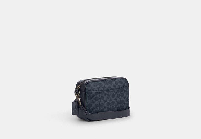 COACH Warner Crossbody Bag In Signature Canvas in Black for