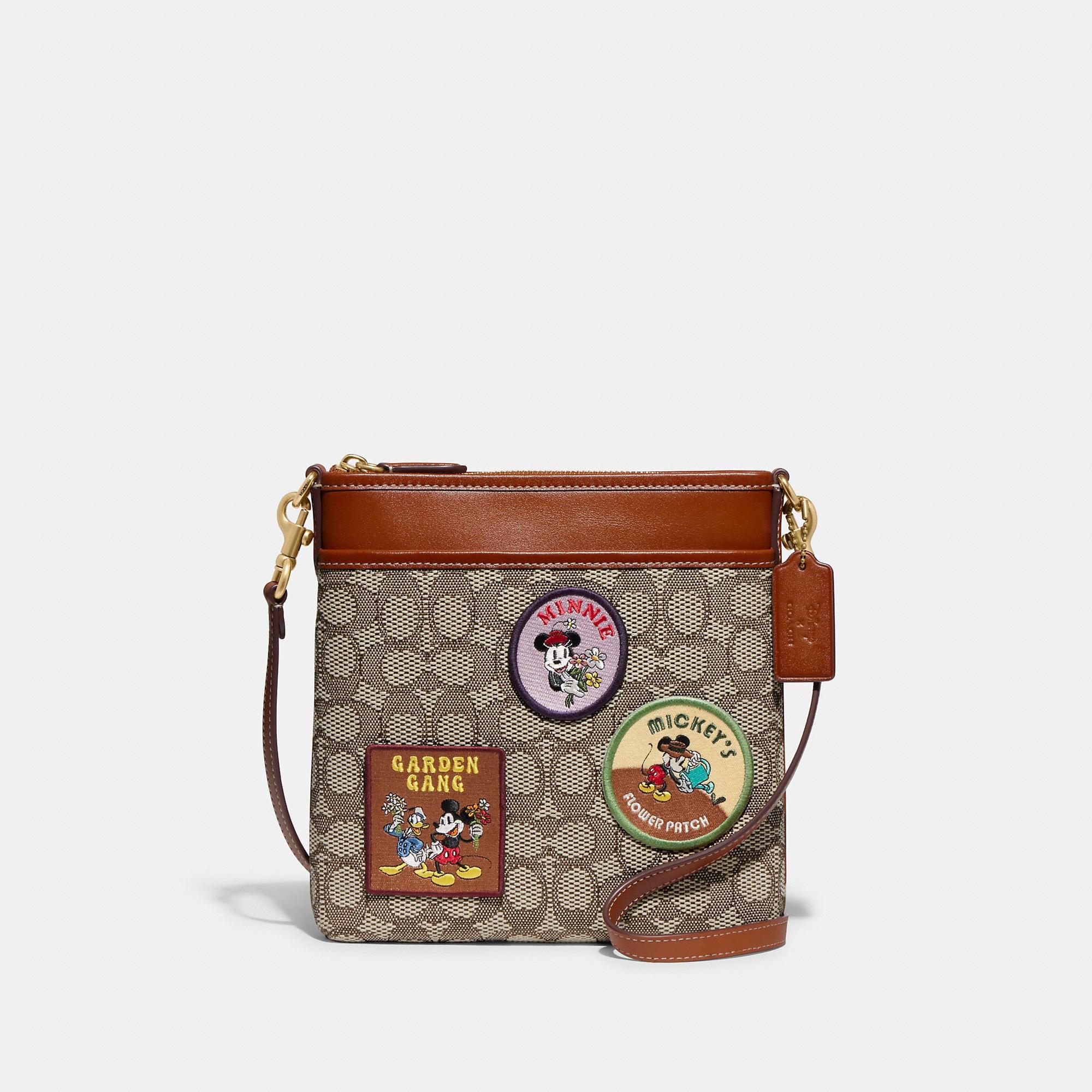 COACH Disney X Kitt Messenger Crossbody In Signature Textile Jacquard With  Patches in Brown | Lyst