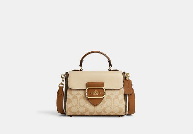 Top handle pouch in signature canvas hotsell