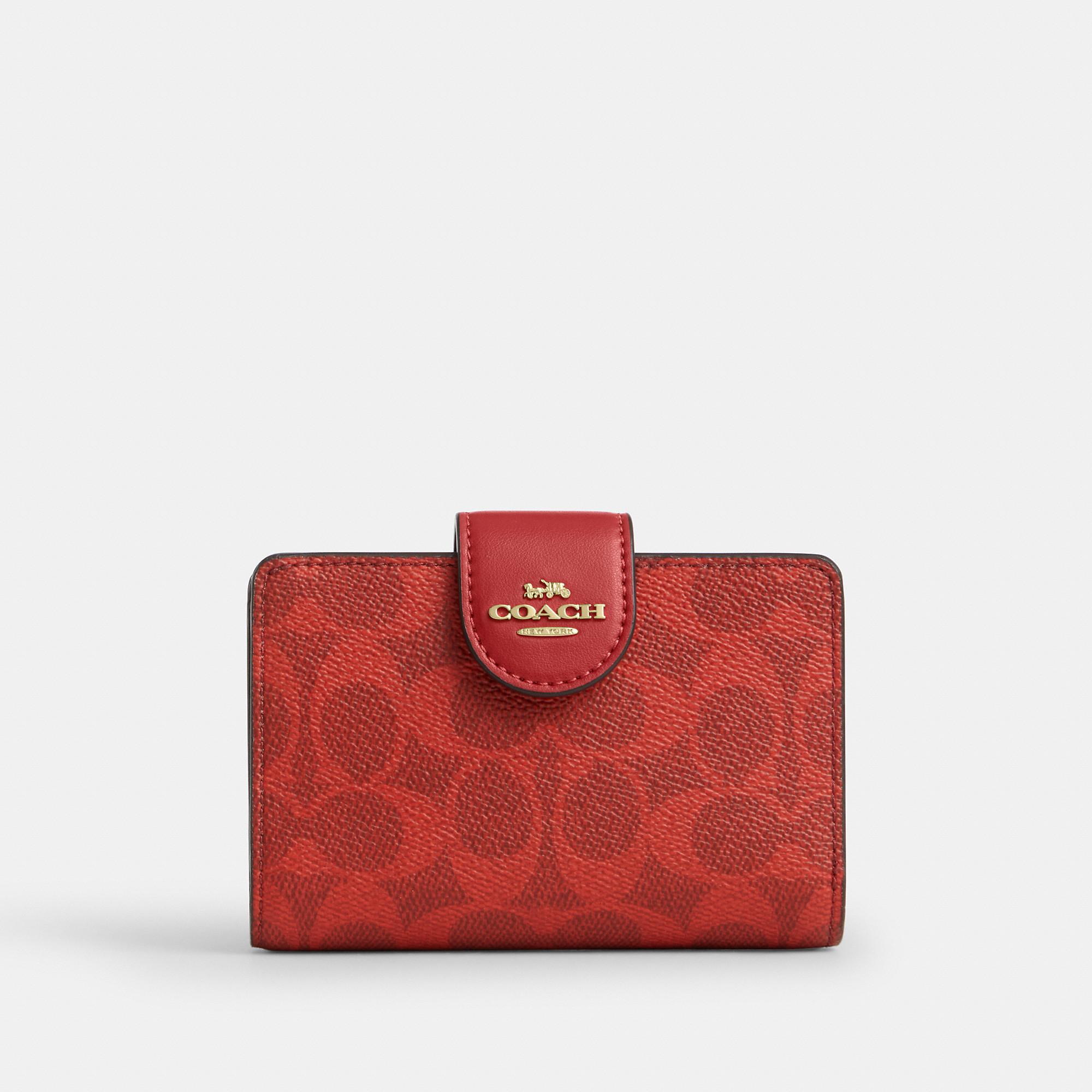 Coach Outlet Large Phone Wallet In Signature Canvas Coach Mila 
