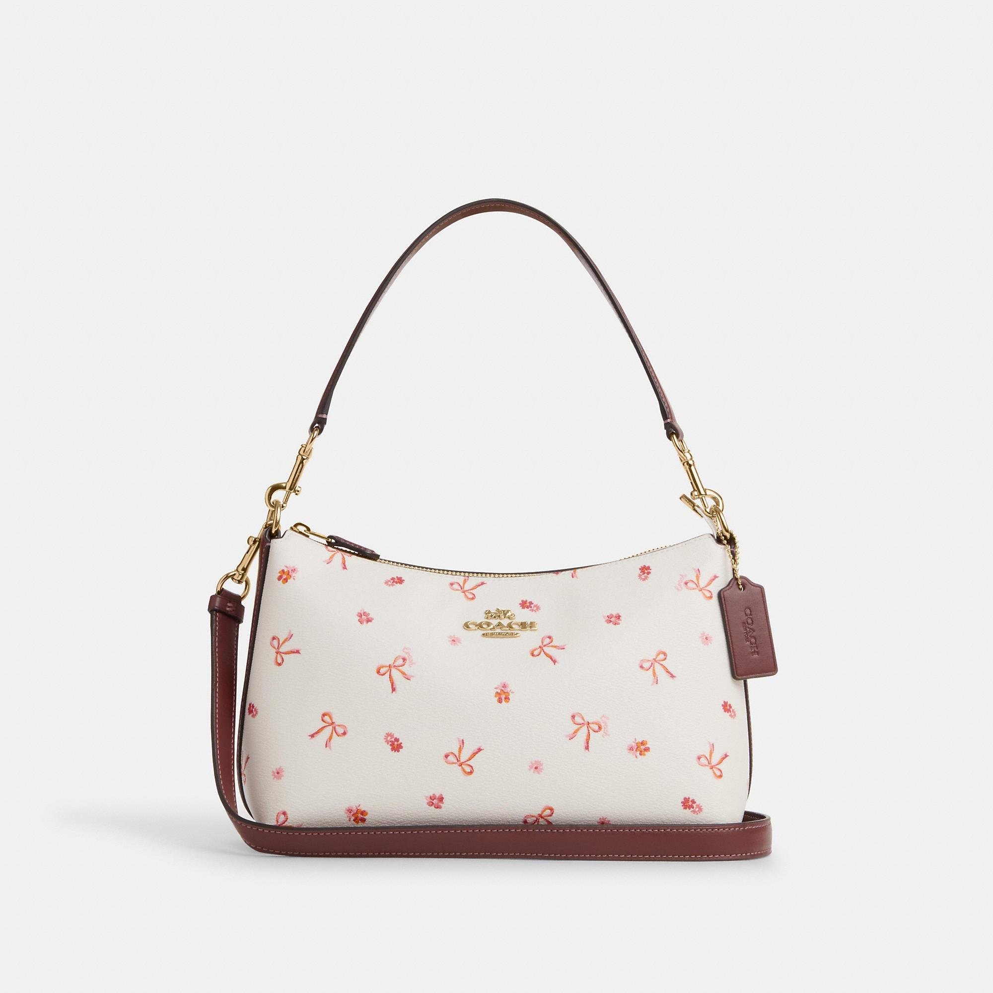 Pink and white coach purse best sale