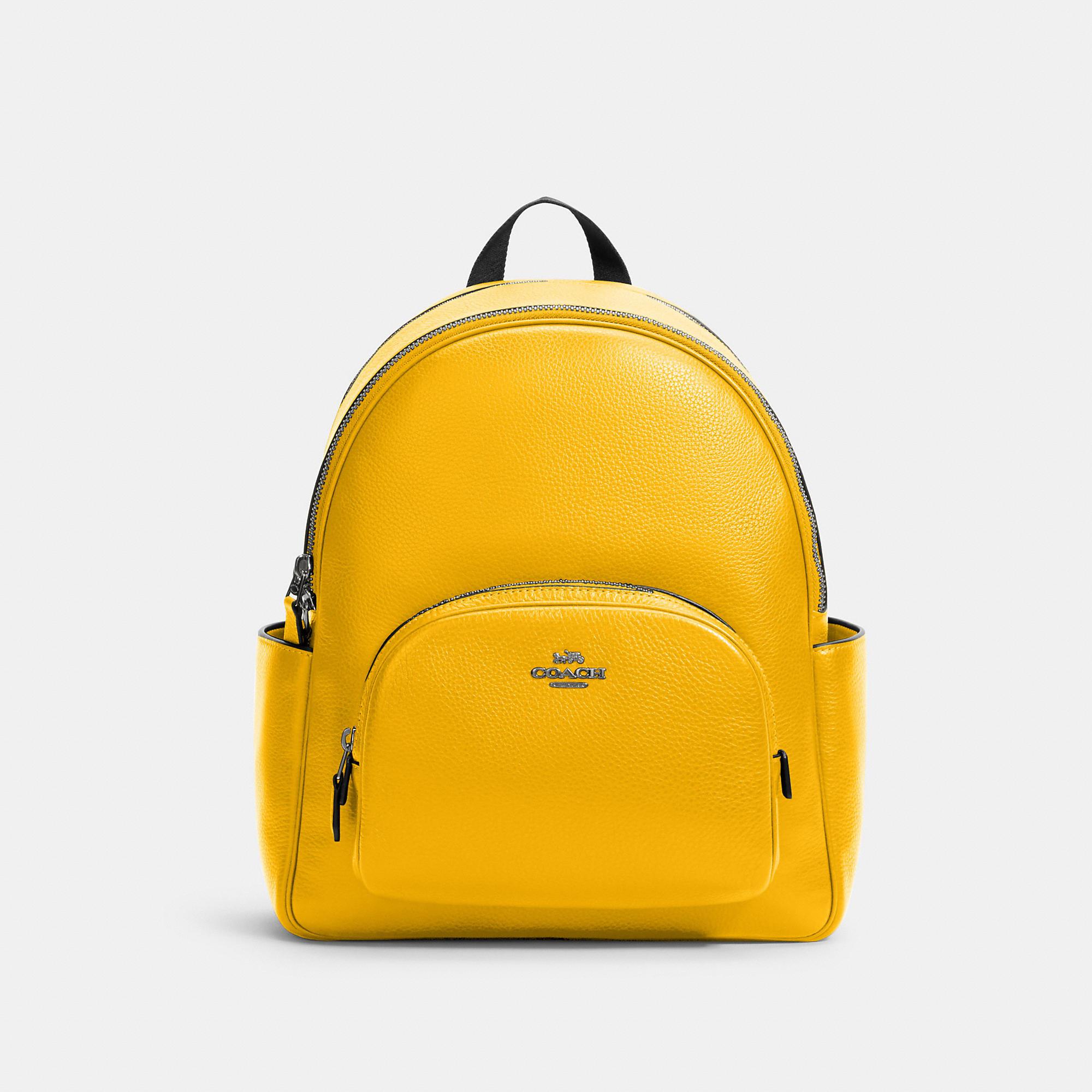 COACH Court Backpack in Yellow | Lyst